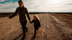 mother and daughter running in texas