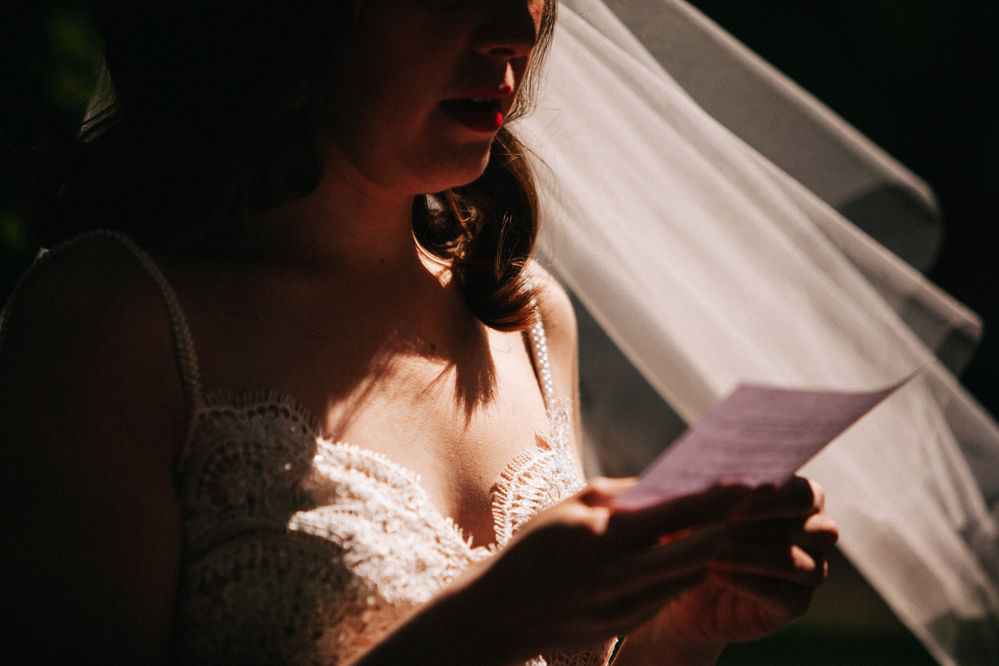 bride reads vows at elopement